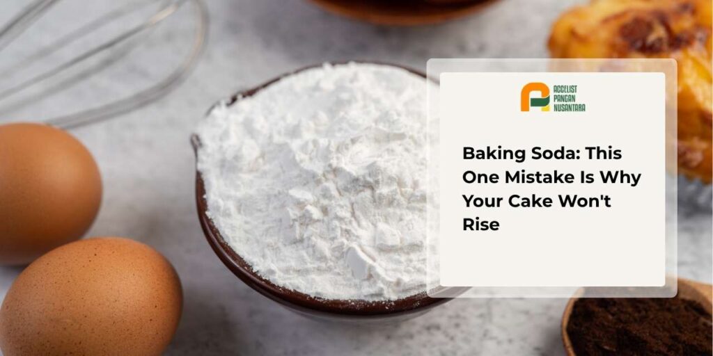 A clump of white baking soda inside a transparent glass bowl, showing its fine powder texture ready to be used as a leavening agent in baking.