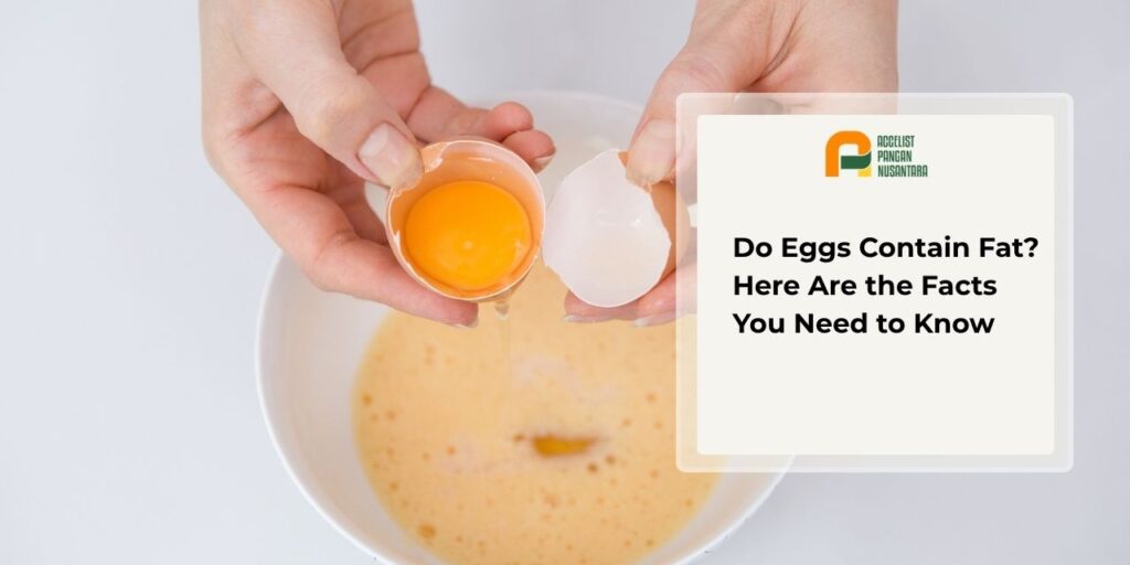 A chicken egg split in half to reveal the egg white and yolk inside, illustrating where the fat content in an egg is actually stored.