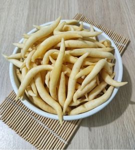 A stack of indonesian cheese sticks which are a popular dry cake dish in Indonesia.