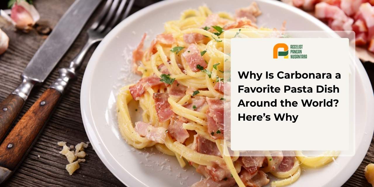A plate of authentic Italian carbonara pasta topped with freshly cracked black pepper and coated in a rich, golden, velvety sauce.