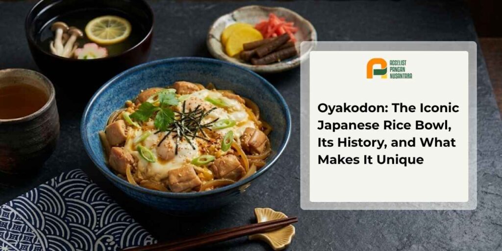 A traditional Japanese oyakodon dish consists of chicken and soft-boiled eggs served over warm rice in a bowl