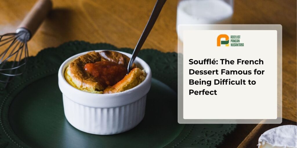 French chocolate soufflé perfectly risen in a ramekin, served warm with a soft and delicate texture